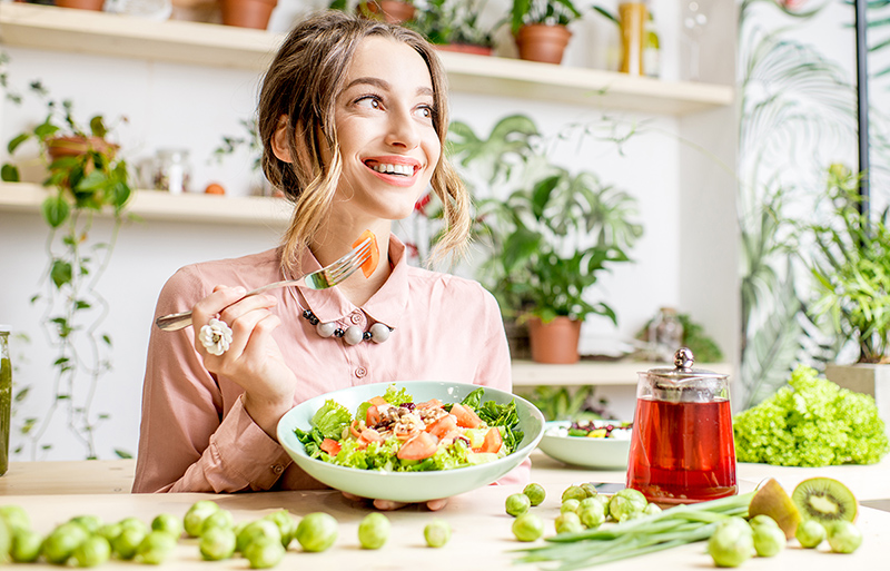 smile facing eating vegetarian food